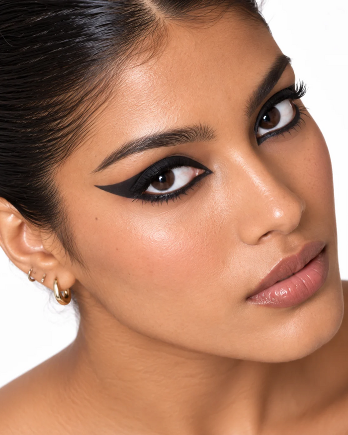 Model wearing a graphic Kiro winged liner