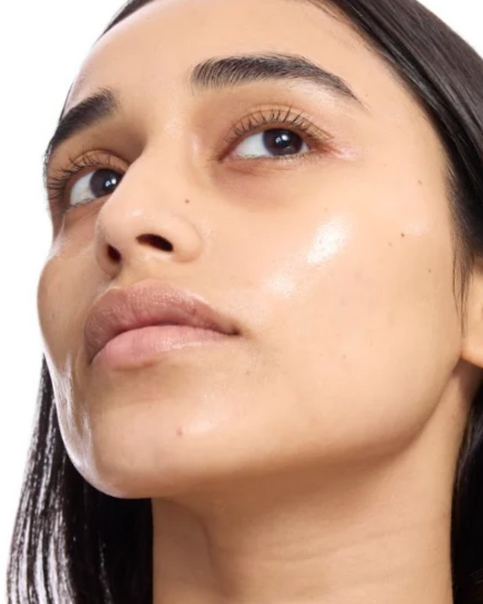 Model with dewy, hydrated skin